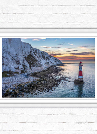 Sunrise at Beachy Head Lighthouse. Framed picture in a choice of styles.