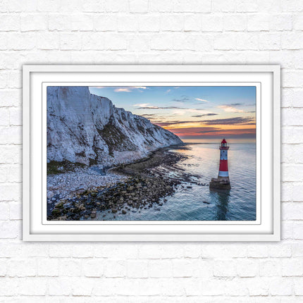 Sunrise at Beachy Head Lighthouse. Framed picture in a choice of styles.