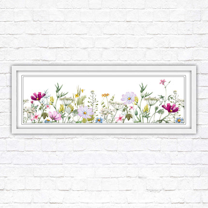 Wild flowers pastel colours on a white background Panoramic framed picture print