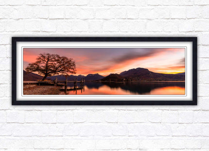 Sunset across the lake. Panoramic framed in a picture frame with choice of colours