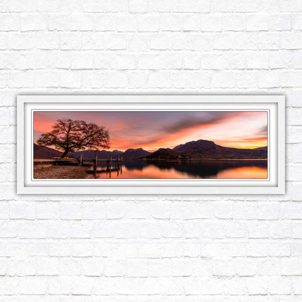 Sunset across the lake. Panoramic framed in a picture frame with choice of colours