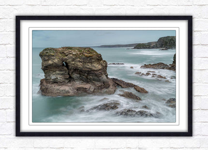 Cornish coastline near Porth Island. Framed picture print with choice of frame colours