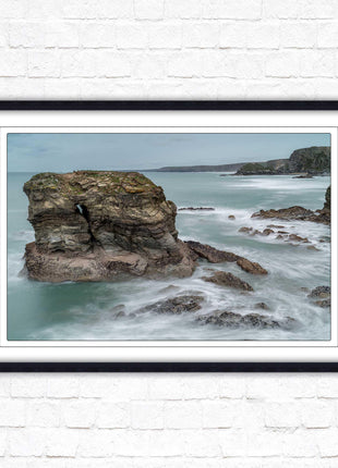 Cornish coastline near Porth Island. Framed picture print with choice of frame colours