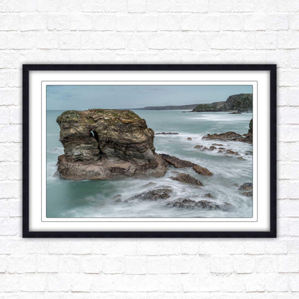 Cornish coastline near Porth Island. Framed picture print with choice of frame colours