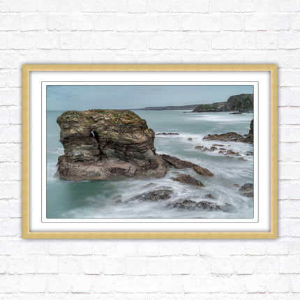 Cornish coastline near Porth Island. Framed picture print with choice of frame colours