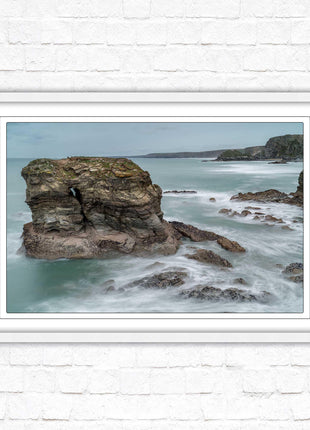 Cornish coastline near Porth Island. Framed picture print with choice of frame colours
