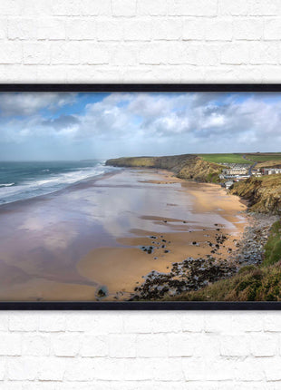 Watergate Bay on a winters day. Cornwall. Framed picture print with choice of frame colours