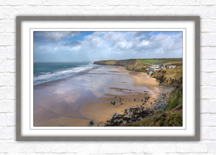 Watergate Bay on a winters day. Cornwall. Framed picture print with choice of frame colours