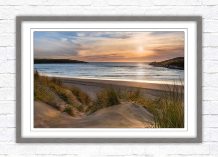 Crantock Beach. Sunlight over the sand dunes, North Cornwall coast. Framed picture print with choice of frame colours