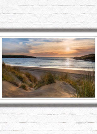 Crantock Beach. Sunlight over the sand dunes, North Cornwall coast. Framed picture print with choice of frame colours