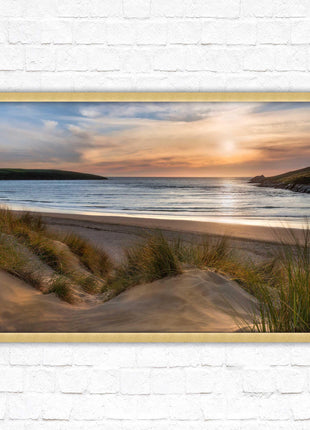 Crantock Beach. Sunlight over the sand dunes, North Cornwall coast. Framed picture print with choice of frame colours