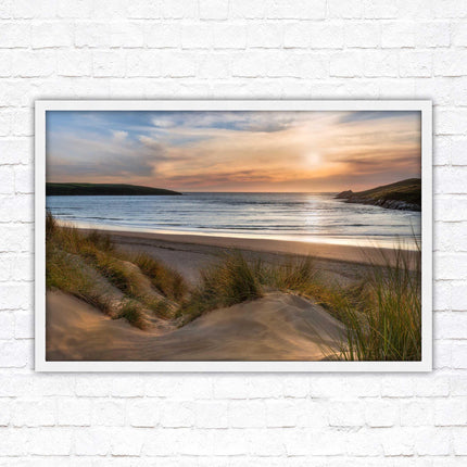 Crantock Beach. Sunlight over the sand dunes, North Cornwall coast. Framed picture print with choice of frame colours