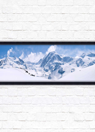 Swiss Alps mountain range. Panoramic framed picture print. Vibrant blue and white image. Choice of frame colours.