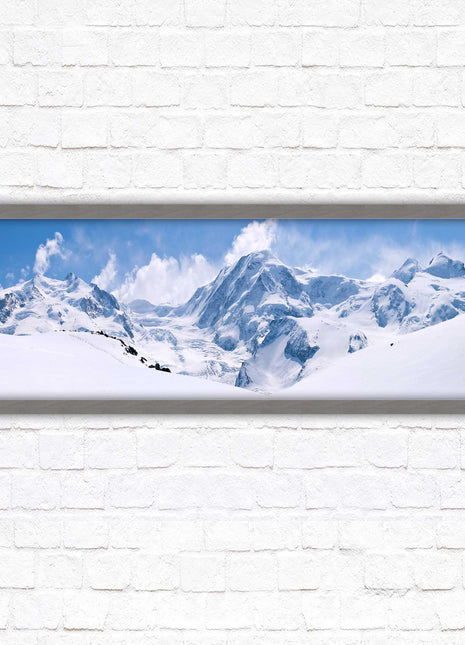 Swiss Alps mountain range. Panoramic framed picture print. Vibrant blue and white image. Choice of frame colours.