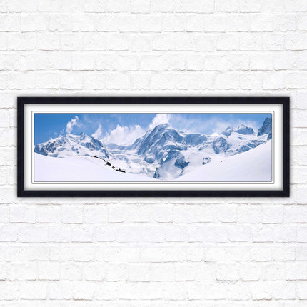 Swiss Alps mountain range. Panoramic framed picture print. Vibrant blue and white image. Choice of frame colours.