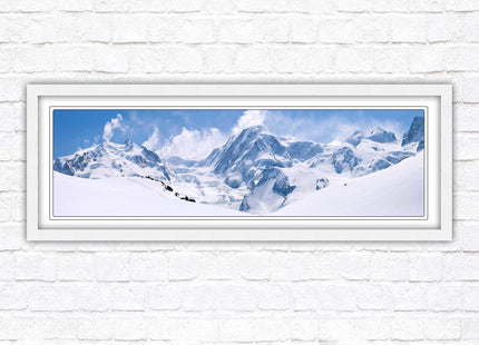 Swiss Alps mountain range. Panoramic framed picture print. Vibrant blue and white image. Choice of frame colours.