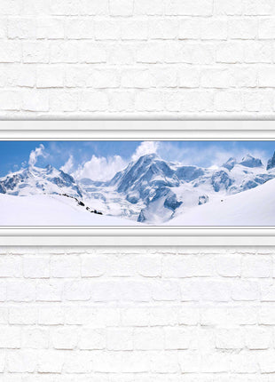Swiss Alps mountain range. Panoramic framed picture print. Vibrant blue and white image. Choice of frame colours.