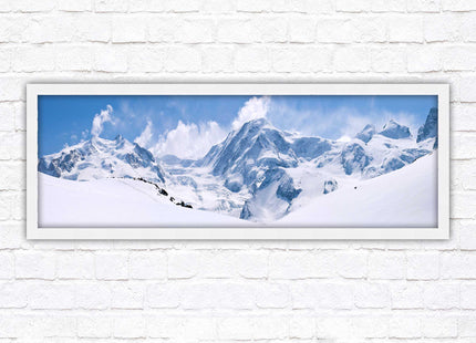 Swiss Alps mountain range. Panoramic framed picture print. Vibrant blue and white image. Choice of frame colours.