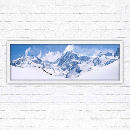 Swiss Alps mountain range. Panoramic framed picture print. Vibrant blue and white image. Choice of frame colours.