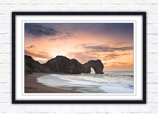 Durdle Door at sunset. Jurassic coast, Dorset. Framed picture print with choice of frame colours