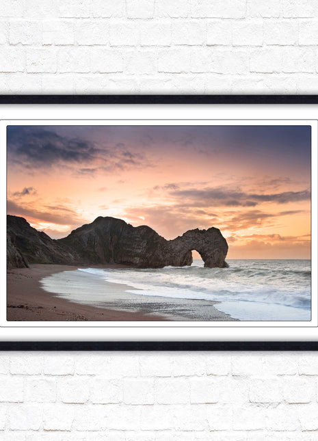 Durdle Door at sunset. Jurassic coast, Dorset. Framed picture print with choice of frame colours