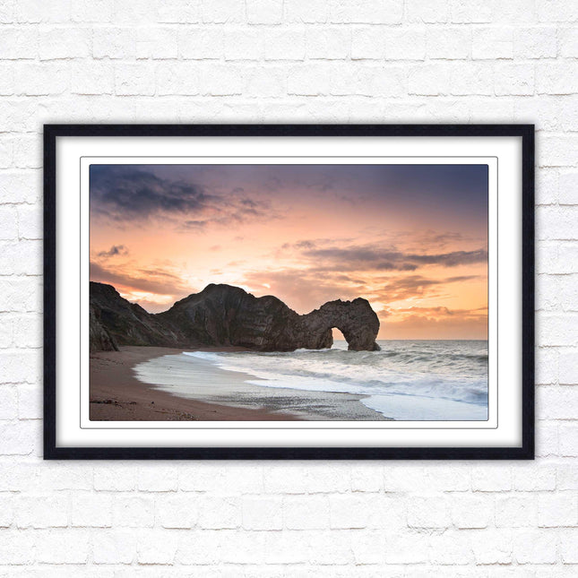Durdle Door at sunset. Jurassic coast, Dorset. Framed picture print with choice of frame colours