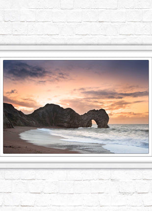 Durdle Door at sunset. Jurassic coast, Dorset. Framed picture print with choice of frame colours