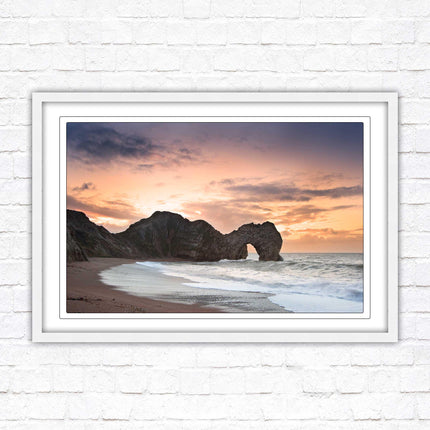 Durdle Door at sunset. Jurassic coast, Dorset. Framed picture print with choice of frame colours
