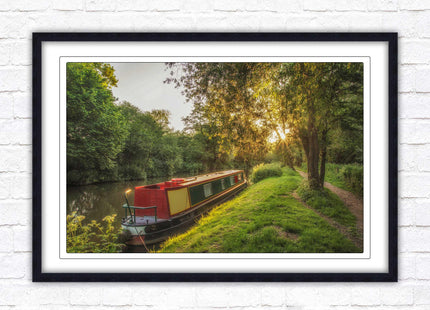 Barge on the canal. Peaceful countryside scenery. Framed picture print with a choice of frame colours.