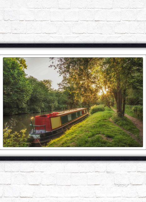 Barge on the canal. Peaceful countryside scenery. Framed picture print with a choice of frame colours.