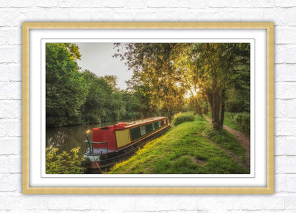 Barge on the canal. Peaceful countryside scenery. Framed picture print with a choice of frame colours.