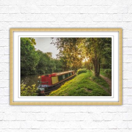Barge on the canal. Peaceful countryside scenery. Framed picture print with a choice of frame colours.