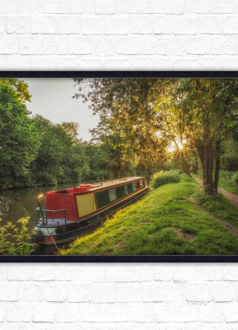 Barge on the canal. Peaceful countryside scenery. Framed picture print with a choice of frame colours.