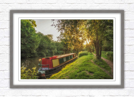 Barge on the canal. Peaceful countryside scenery. Framed picture print with a choice of frame colours.