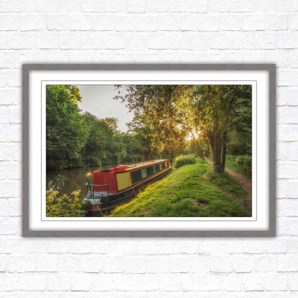 Barge on the canal. Peaceful countryside scenery. Framed picture print with a choice of frame colours.