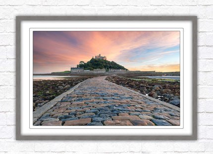 St Michael's Mount at sunset. Cornwall. Framed picture print with a choice of frame colours. Beach seascape, tourist destination.