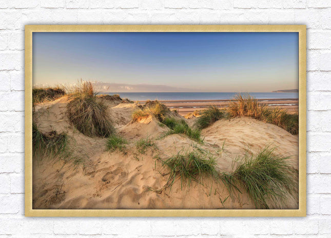 Sunrise over the sand dunes. Framed picture print. Coastal scenery.
