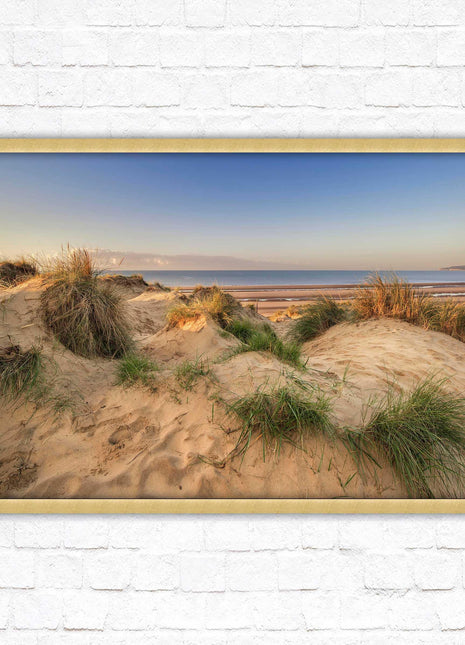 Sunrise over the sand dunes. Framed picture print. Coastal scenery.