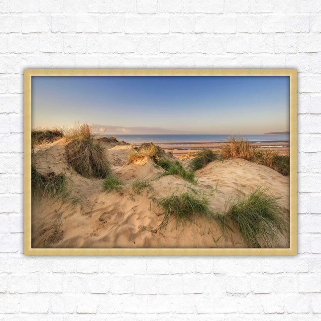 Sunrise over the sand dunes. Framed picture print. Coastal scenery.