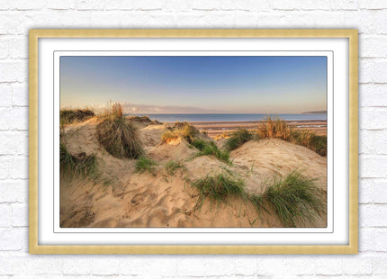 Sunrise over the sand dunes. Framed picture print. Coastal scenery.
