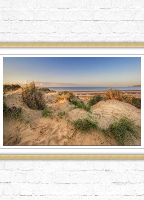 Sunrise over the sand dunes. Framed picture print. Coastal scenery.