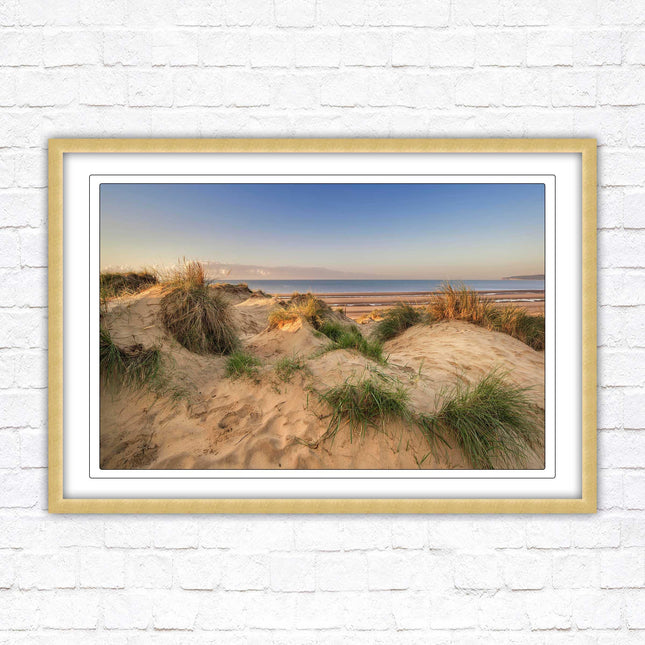 Sunrise over the sand dunes. Framed picture print. Coastal scenery.