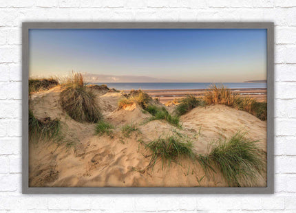 Sunrise over the sand dunes. Framed picture print. Coastal scenery.
