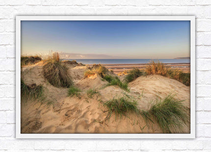 Sunrise over the sand dunes. Framed picture print. Coastal scenery.