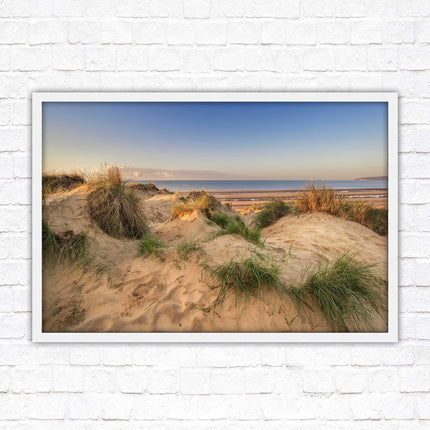 Sunrise over the sand dunes. Framed picture print. Coastal scenery.