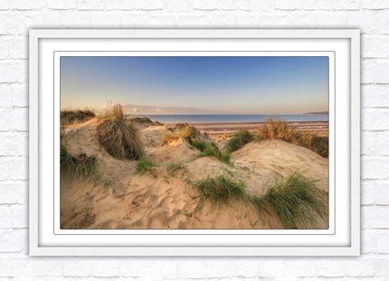 Sunrise over the sand dunes. Framed picture print. Coastal scenery.