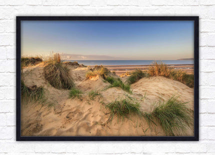 Sunrise over the sand dunes. Framed picture print. Coastal scenery.