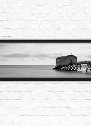 Lifeboat station at sea. Panoramic framed picture print. Black and white image. A choice of picture frames.