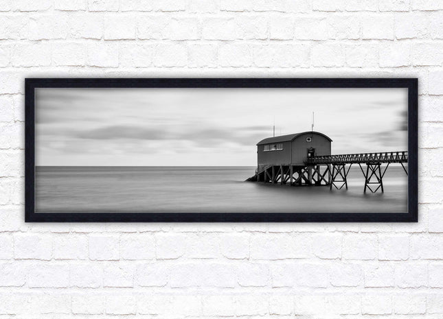 Lifeboat station at sea. Panoramic framed picture print. Black and white image. A choice of picture frames.