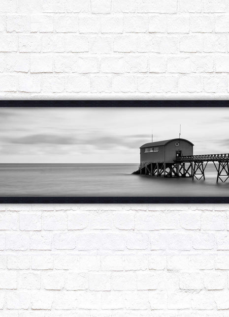 Lifeboat station at sea. Panoramic framed picture print. Black and white image. A choice of picture frames.